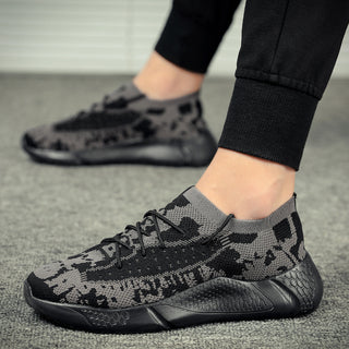 Stylish camouflage-pattern sneakers with athletic design, perfect for jogging or casual wear.