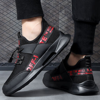 Stylish men's black and red athletic sneakers with bold text branding, displayed on a patterned tiled floor.