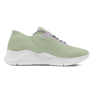 Stylish and comfortable women's mesh sneakers from the K-AROLE brand. The breathable, lightweight design features a pale green upper with a chunky sole for added support and traction. These versatile sneakers are perfect for conquering any season in fashion-forward style.
