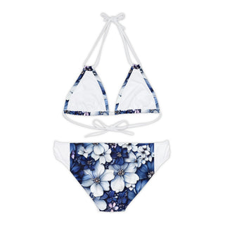 Stylish floral print bikini set featuring a triangular top with tie-up string closure and a pair of matching high-waisted bikini bottoms, displayed on a white background.