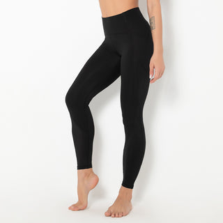 Sleek black yoga pants with a high-waisted design for a flattering, comfortable fit during athletic activities.