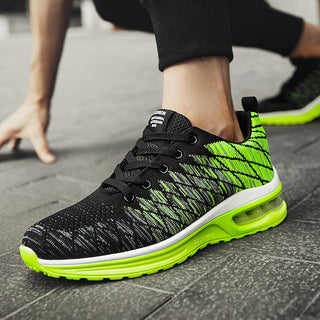 Stylish men's sneakers with neon green and black accents, featuring an air cushion sole for comfort and a trendy, lightweight mesh upper for breathability. The sneakers appear to be designed for casual or athletic wear, with a modern, sporty aesthetic.