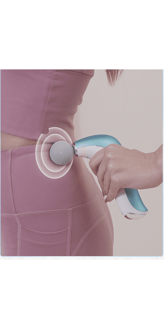Compact electric massage gun for deep tissue therapy, held in hand against a person's lower back.