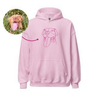 Adorable pink hooded sweatshirt with a playful dog illustration, perfect for casual and comfortable wear.