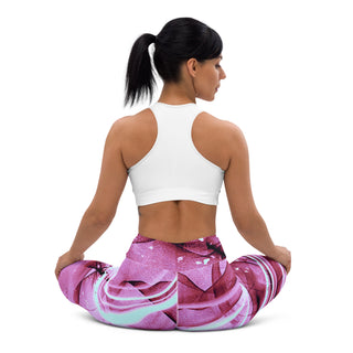 Lavender yoga leggings worn by a woman with long dark hair styled in a ponytail, against a white background.