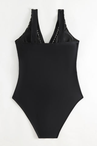 Sleek black bodysuit with lace trim by Trendsi, a stylish women's fashion brand offering trendy, comfortable apparel and accessories.