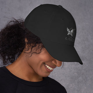 Black K-AROLE branded baseball cap with butterfly logo on dark-haired woman