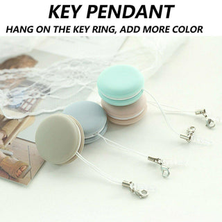 Colorful macaroon-shaped key pendant with hooks for attaching to key rings, providing a stylish and functional accessory.