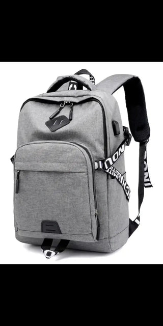Stylish grey laptop backpack with USB charging port and sleek design for modern, on-the-go convenience.