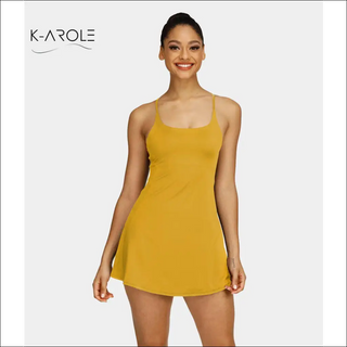 Woman's pocketed yellow tennis yoga running dress from K-AROLE