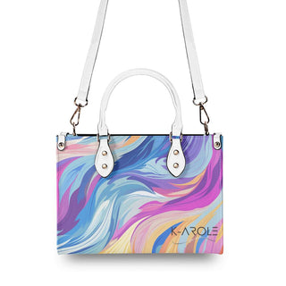 Stylish women's handbag with a vibrant swirling pattern in pastel colors, featuring the K-AROLE brand logo, and equipped with adjustable straps for versatile carrying.