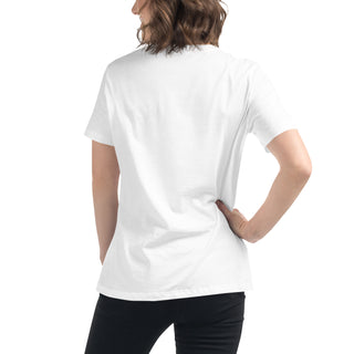 White relaxed t-shirt with simple design worn by a person with long, curly brown hair.