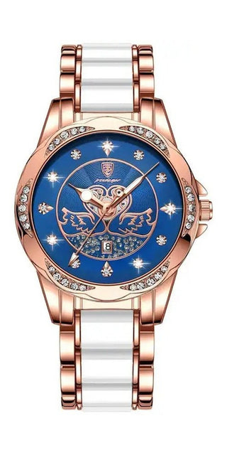 Elegant rose gold women's watch with blue dial featuring a decorative floral design and crystal accents. Luxurious bracelet style with a mix of white and rose gold tones. Stylish and sophisticated timepiece from the K-AROLE brand.