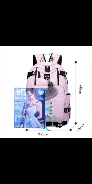 Stylish women's backpack with external USB charging port. Light pink backpack with cartoon character design, ideal for school, work or travel.
