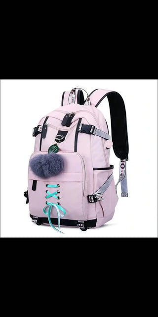 Stylish women's backpack with external USB charging port and various compartments, available in a trendy light pink color from the K-AROLE brand.